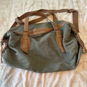Mossino green and tan travel bag NWOT